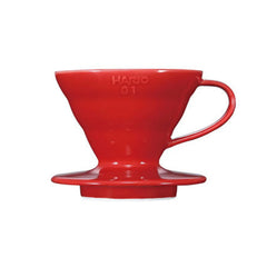Hario V60 red ceramic coffee dripper with cone shape and handle on white background.