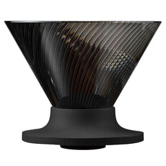 Black V60 dripper with tapered cone shape and interior vertical rib pattern, front view.