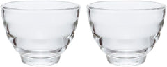 Set of two empty Yunomi glasses displayed on white background showing paired design