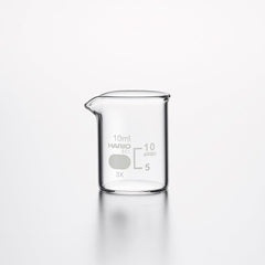 Empty 10ml HARIO glass beaker with measurement markings on white.