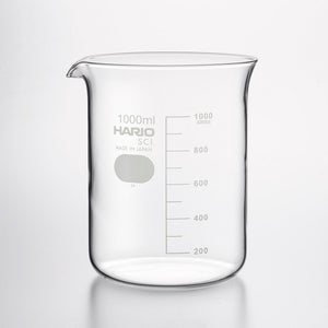 Empty 1000ml HARIO glass beaker with scale markings on white.
