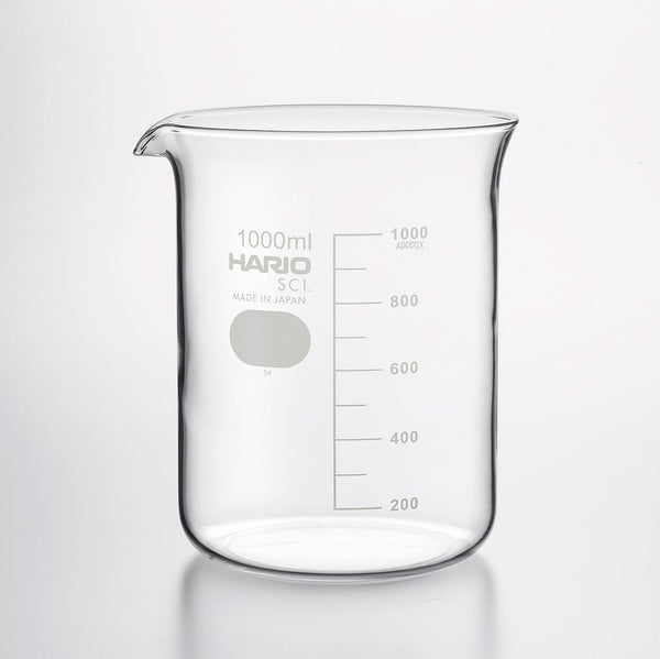 Empty 1000ml HARIO glass beaker with scale markings on white.