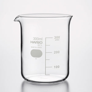 Empty 300ml HARIO glass beaker with measurement lines on white.
