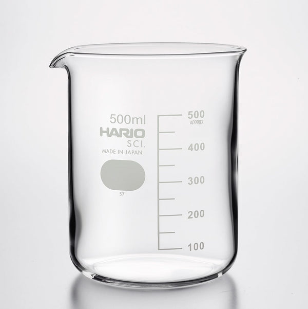 Empty 500ml HARIO glass beaker with pouring spout on white.
