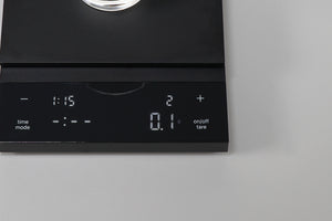 Close-up of black Polaris scale display panel with digital readout and control buttons