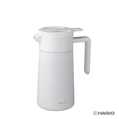 White ceramic-coated thermal server with lid and handle against plain white background for product showcase