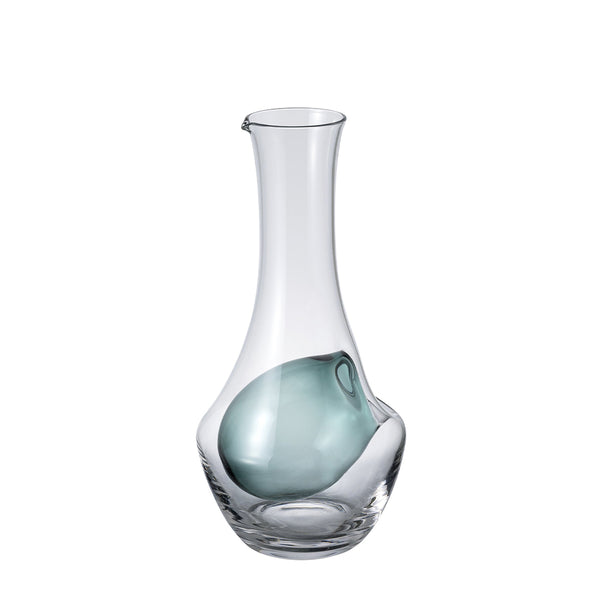 Clear glass carafe with turquoise-tinted ice well chamber, elegant tapered neck with pouring spout.