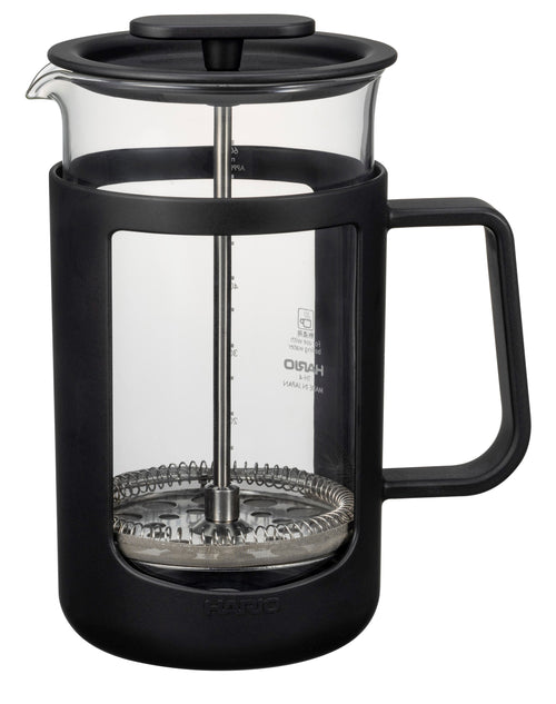Black Hario press with glass carafe and metal plunger strainer shown front angle on white background