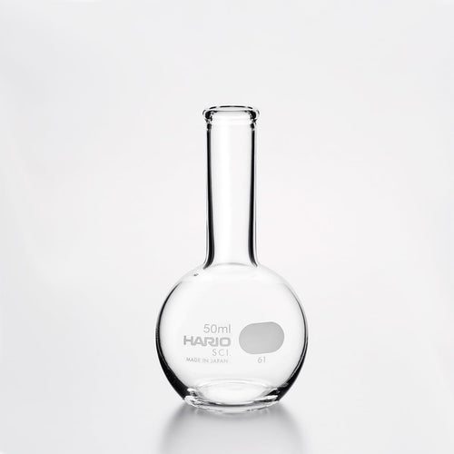 Empty Hario flask vase 50ml with narrow neck and round base on neutral background.