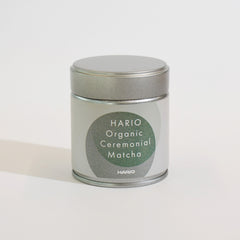 HARIO Organic Ceremonial Matcha in silver tin with green circle label.