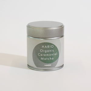 HARIO Organic Ceremonial Matcha in silver tin with green circle label.
