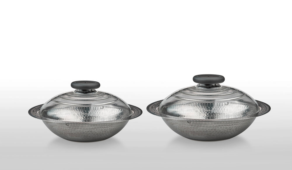 HARIO stainless steel cooking pot with hammered finish and glass lid with black knob.