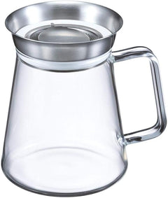 Empty glass tea server with stainless steel mesh filter and metal collar rim.