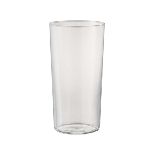 Empty tall cylindrical glass with thin walls on white background.