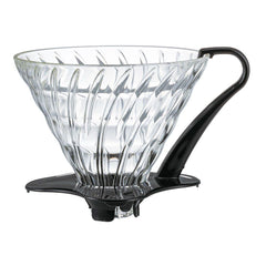Glass V60 coffee dripper with black handle and ridged cone interior for pour-over brewing
