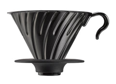 Black metal V60 dripper with spiral ridge pattern viewed from front angle on white background.