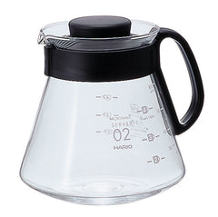 Empty Hario V60 microwave server model 02 with measurement markings and black lid on white background
