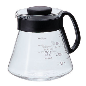 Empty Hario V60 microwave server model 02 with measurement markings and black lid on white background