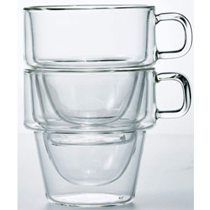 Three clear double-wall glass mugs with handles stacked vertically, demonstrating stackable design.